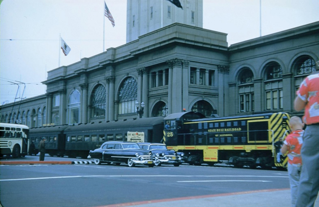 A photo of the Ferry Building in 1940 with State Belt freight trains passing. (Photo credit: sfbayrail.com)