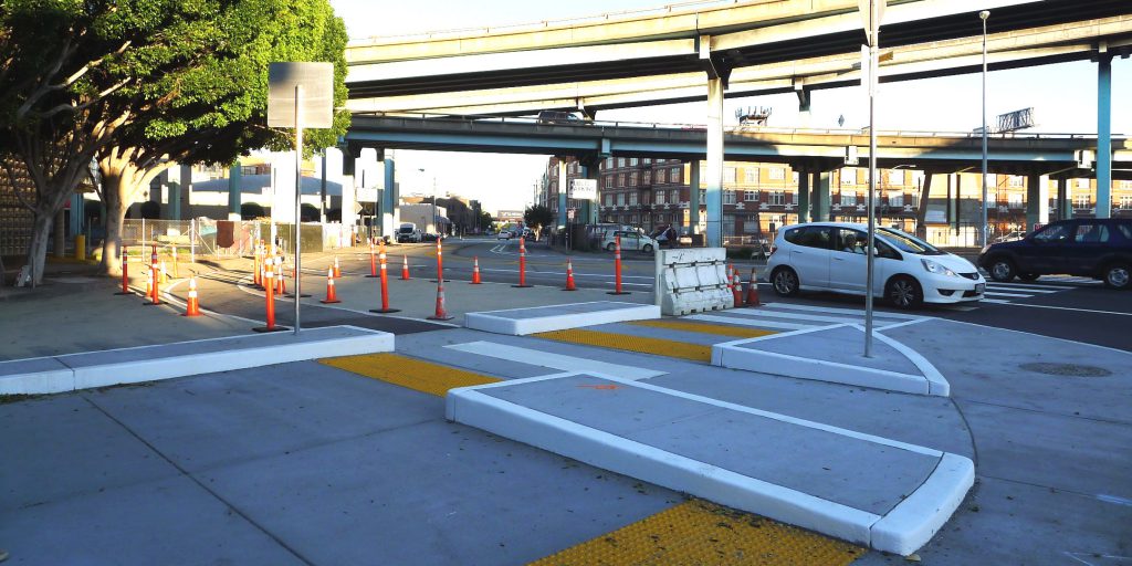 New curbs help separate all modes and calm traffic at Ninth and Division Streets.