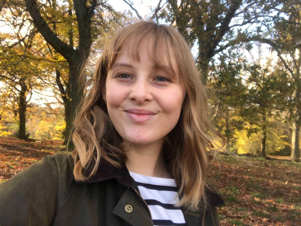 Rachel Clyde photo of rachel smiling in the woods
